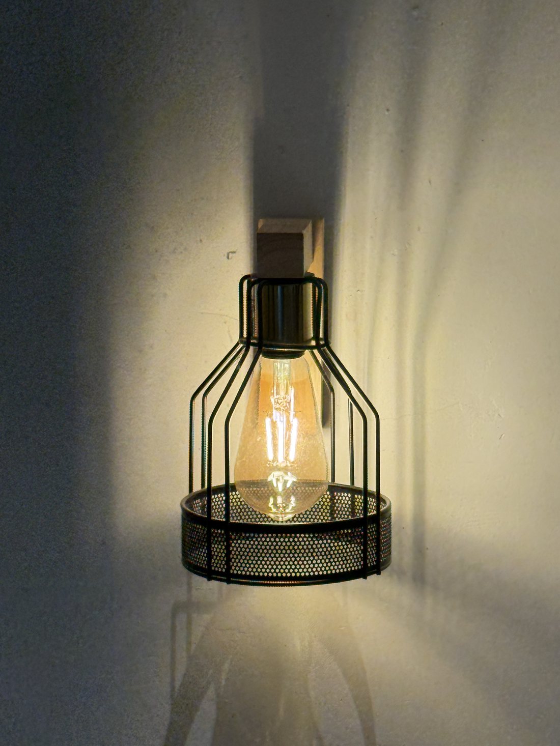 Warm lantern light inside the cottage
